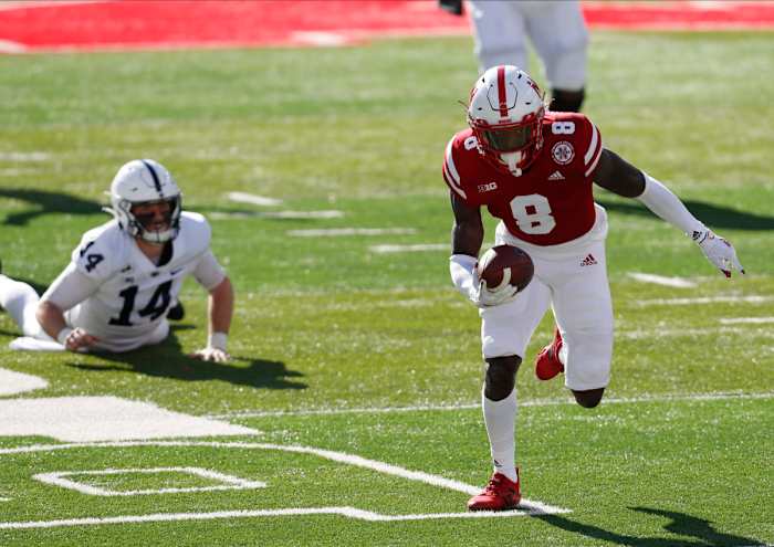 Safety Deontai Williams runs 26 yards for a touchdown after knocking the ball loose from Penn State quarterback Sean Clifford on a second-quarter sack.